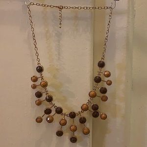 Necklace brown and gold. Never worn.